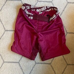 Maroon BJJ shorts. 93 brand